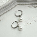 Geometric round pearl earrings with titanium steel alloy construction for women