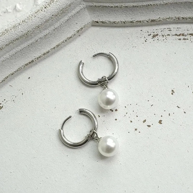Geometric round pearl earrings with titanium steel alloy construction for women