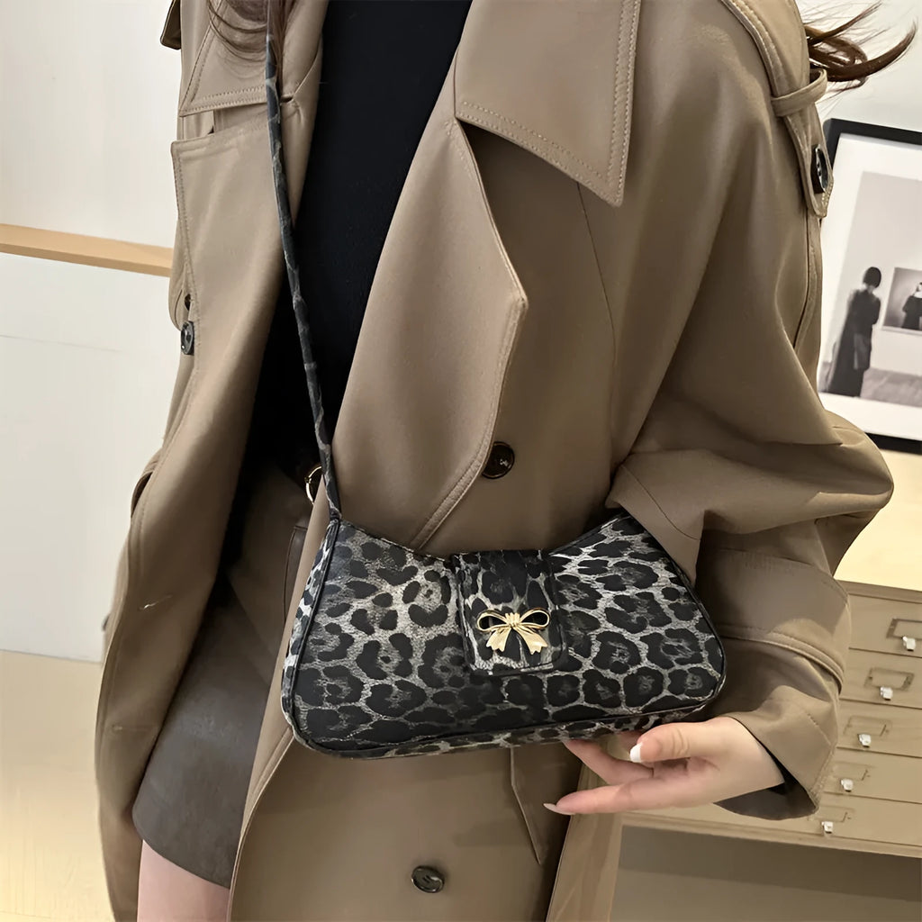 Casual PU leather handbag with sandwich pocket in black colour showing dimensions and design