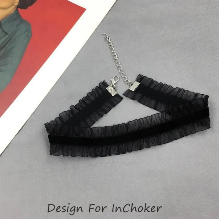 Close-up of a velvet ruffled flower pendant on a snake bones chain necklace in light coffee colour.