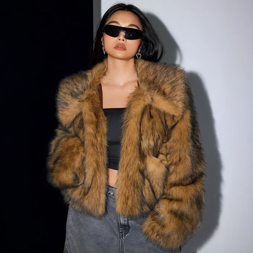 Women's short black artificial fur coat with a full fur collar and long sleeves.