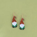 Pair of festive red and green Santa Claus cartoon character acrylic fashion earrings.