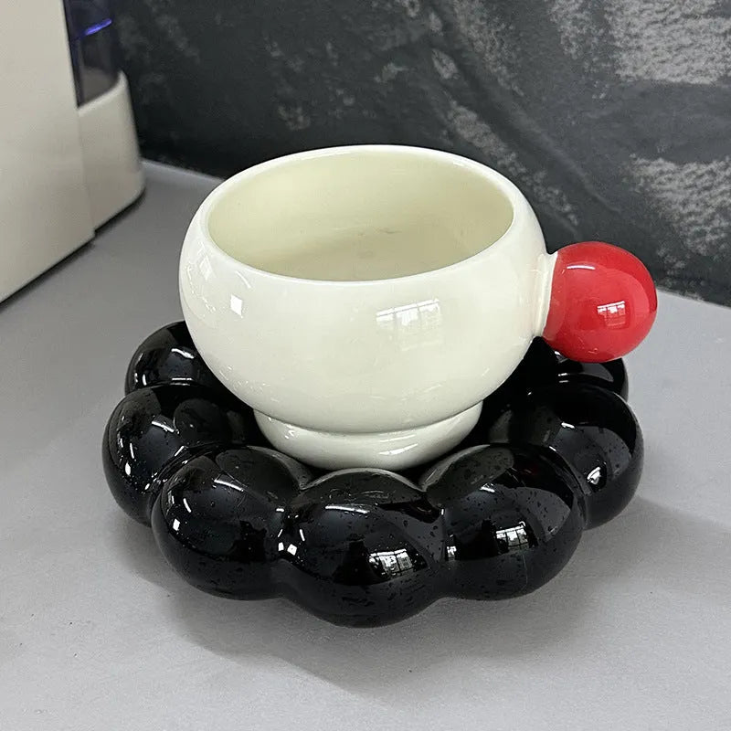 Ceramic coffee set with a 250ml cup and matching dish in a simple solid colour design.