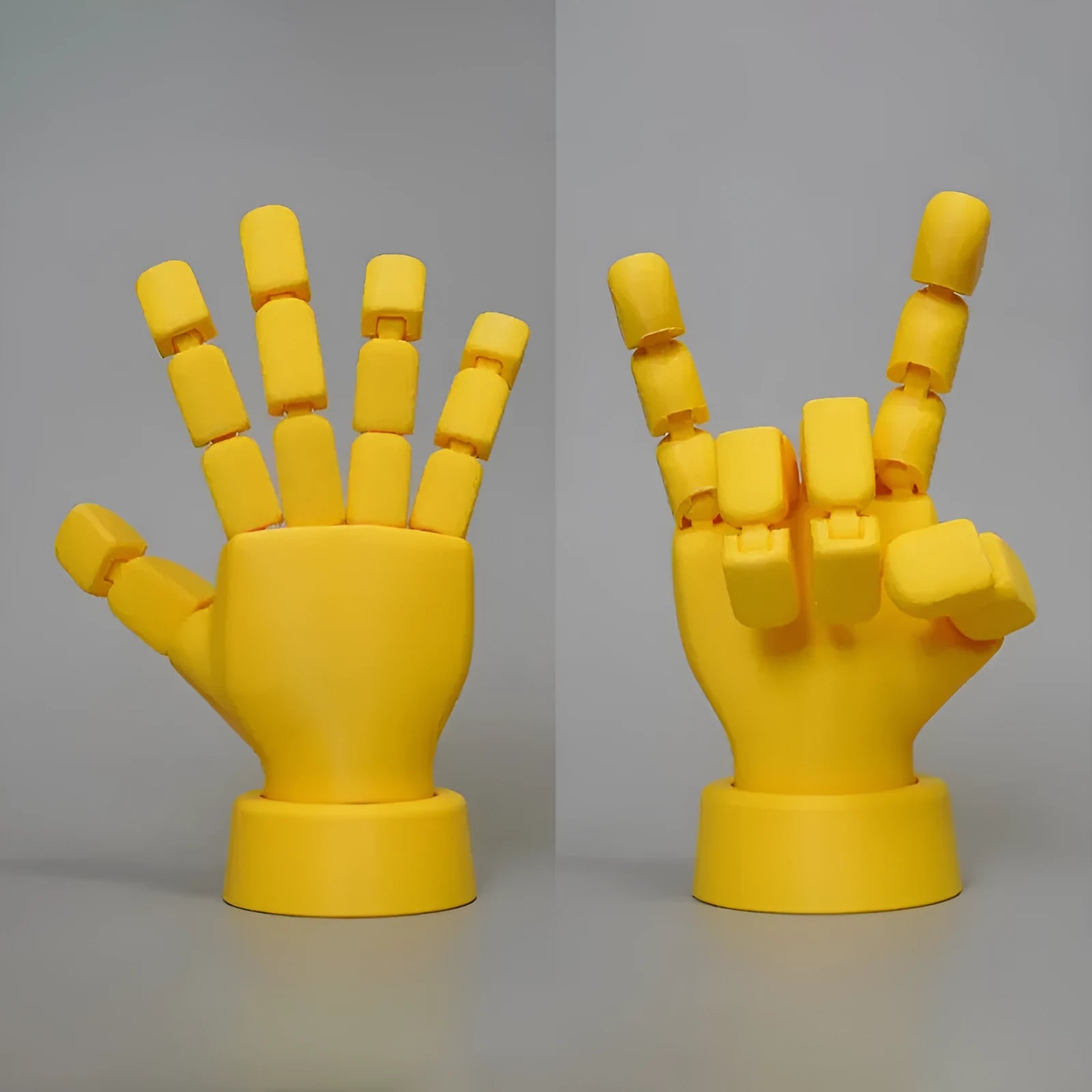 Yellow 3D printed hand props with movable joints for photography and displays