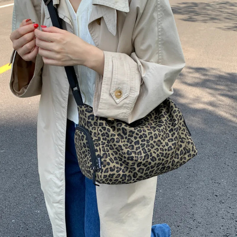 Leopard print shoulder messenger bag with stripe option and visible stitching details