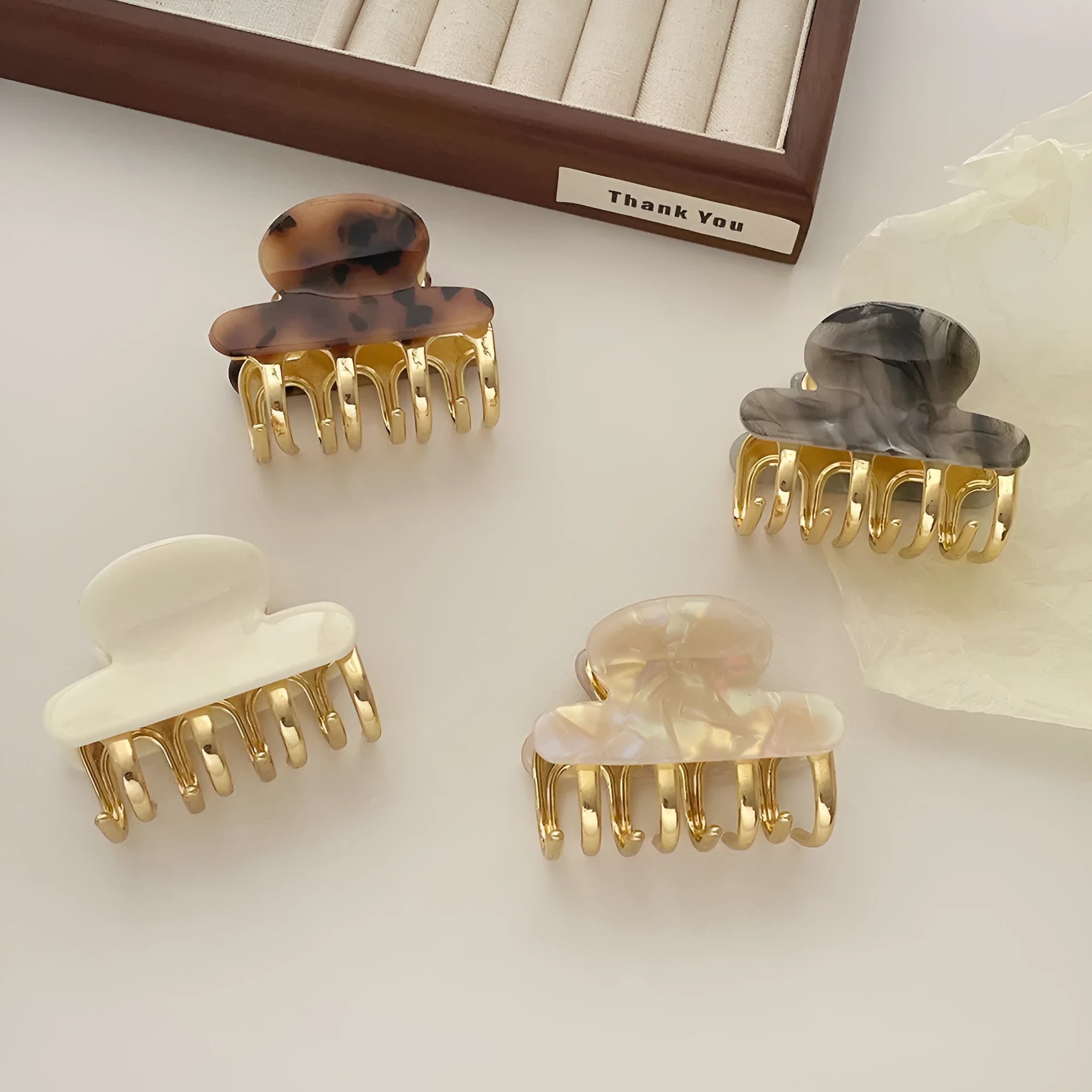 Medium acetate women's hair barrette with metal grip in leopard print retro design