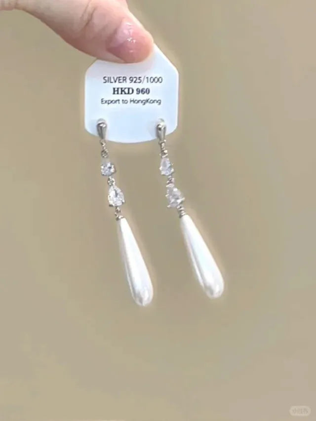 Geometric alloy earrings with rhinestone accents and little star tassel design for women
