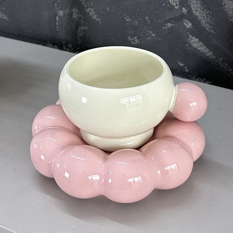 Ceramic coffee set with a 250ml cup and matching dish in a simple solid colour design.