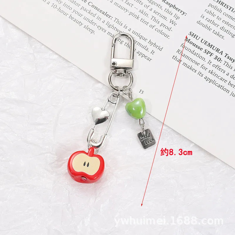 Plastic resin mobile phone charm keychain with fruit patterns including apple and strawberry designs