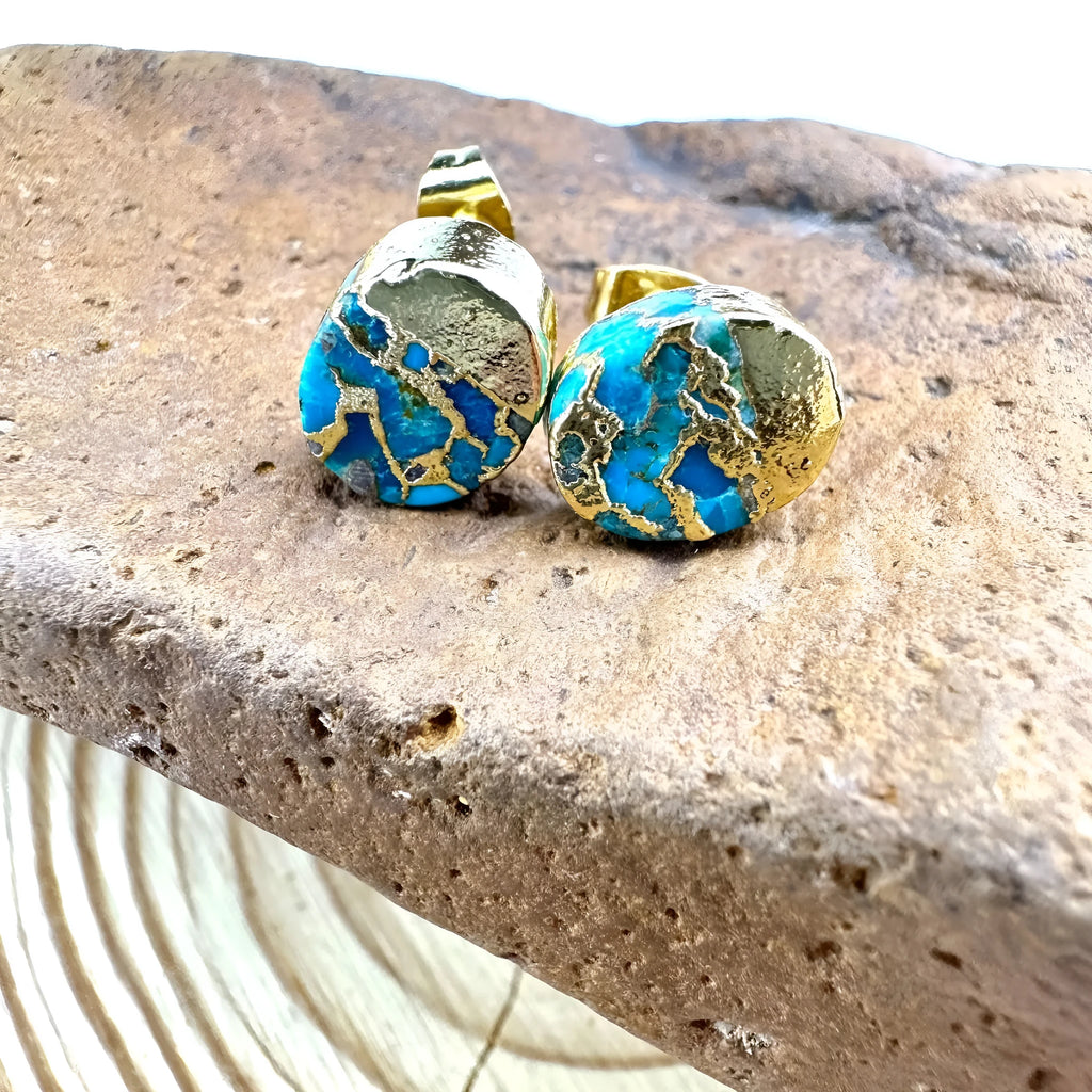 A pair of handmade natural stone stud earrings with an irregular bohemian shape in ER1031 colour.
