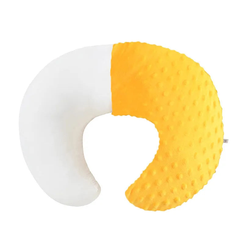Multifunctional nursing pillow with a removable cover in grey, designed for feeding support and spill prevention.