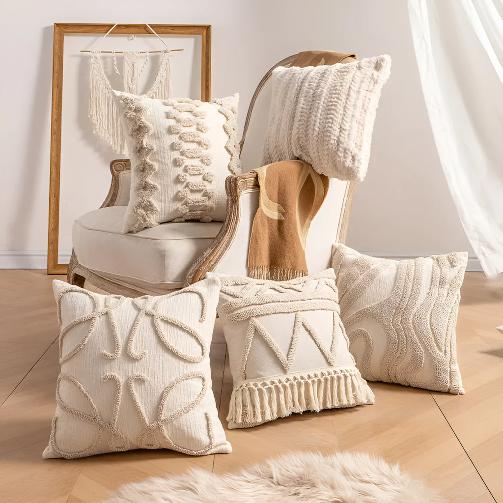 Knitted cushion cover with tassel trim in a striped pattern, shown in a choice of colours including spiral dots and woven rabbit fur.