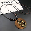 Wooden leaf ethnic necklace with electroplated pendant and adjustable wax line chain measuring 51-80cm