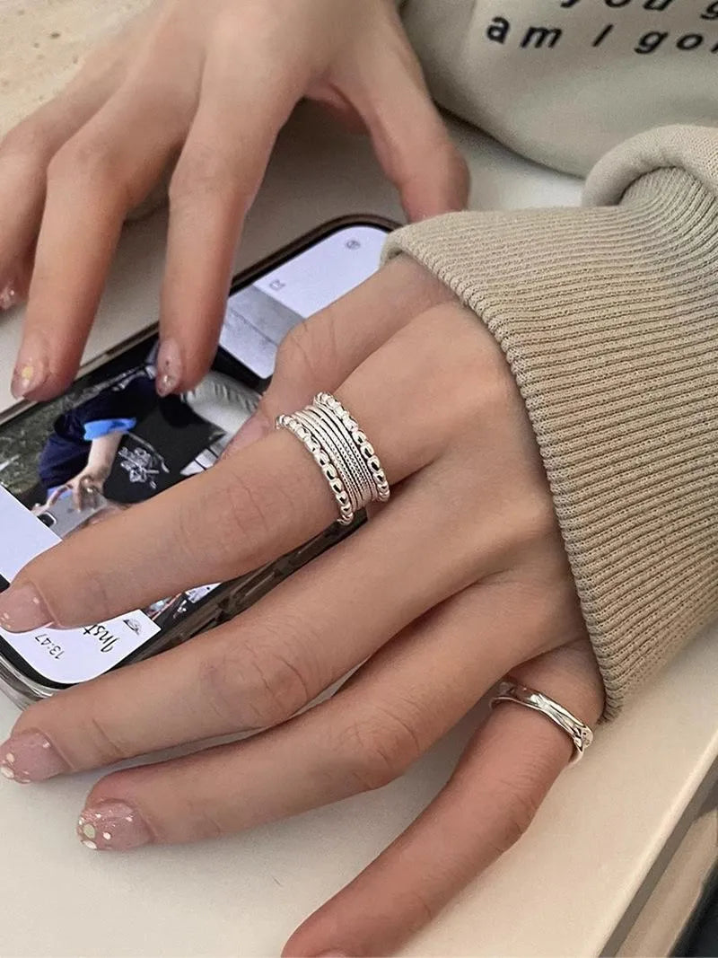 Adjustable opening copper ring with geometric woven twisted multilayer design for women