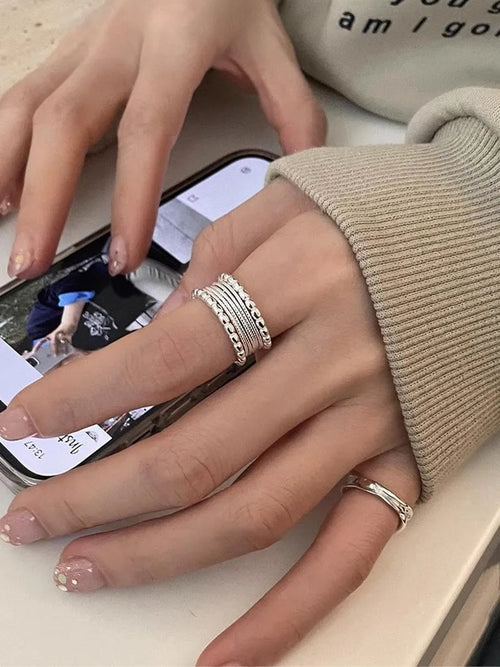Adjustable opening copper ring with geometric woven twisted multilayer design for women
