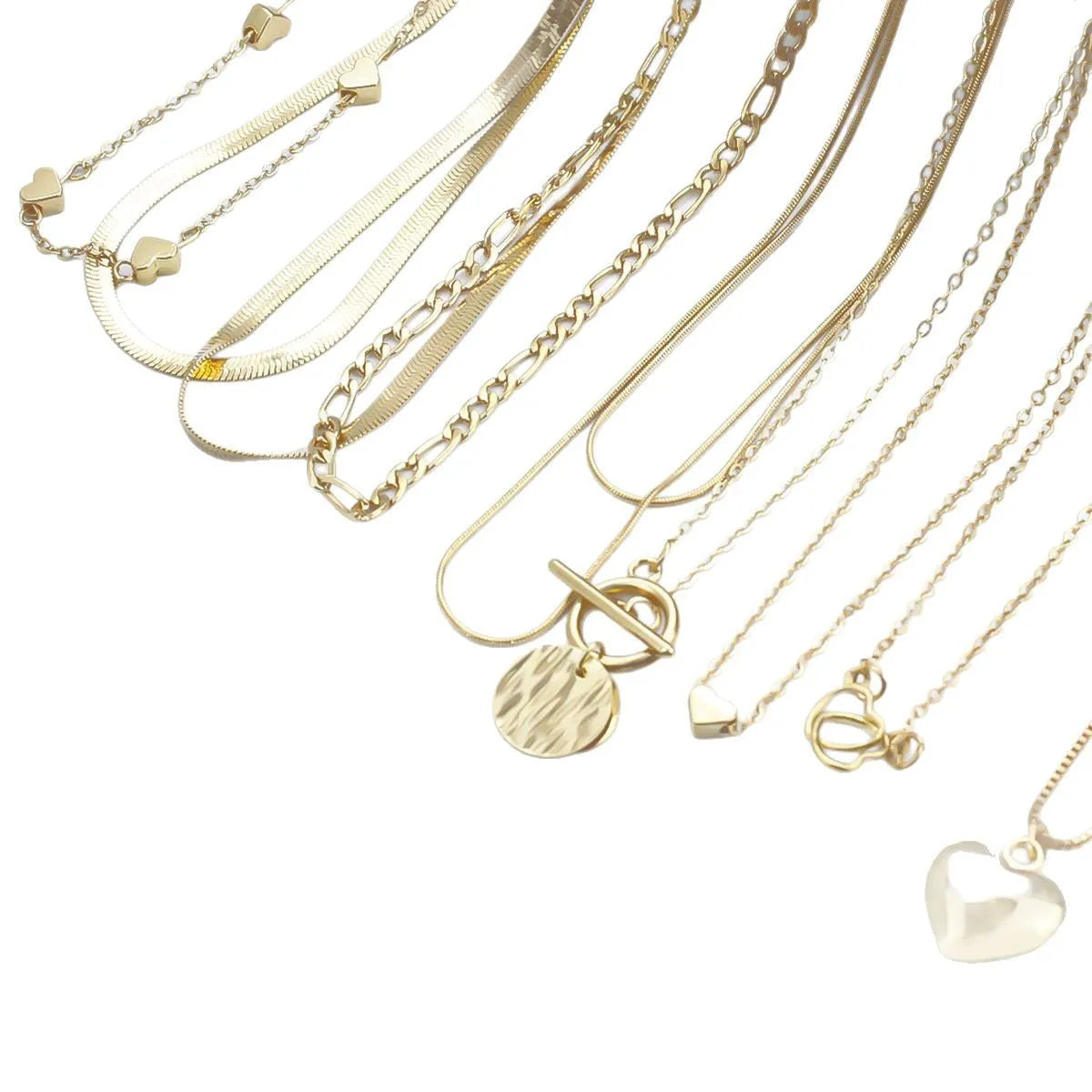 10-piece gold necklace set for women with adjustable snake bones chain and simple alloy pendants