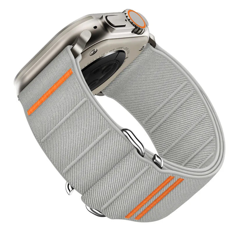 Elastic nylon Apple Watch replacement band with stainless steel buckle shown in multiple colour options.