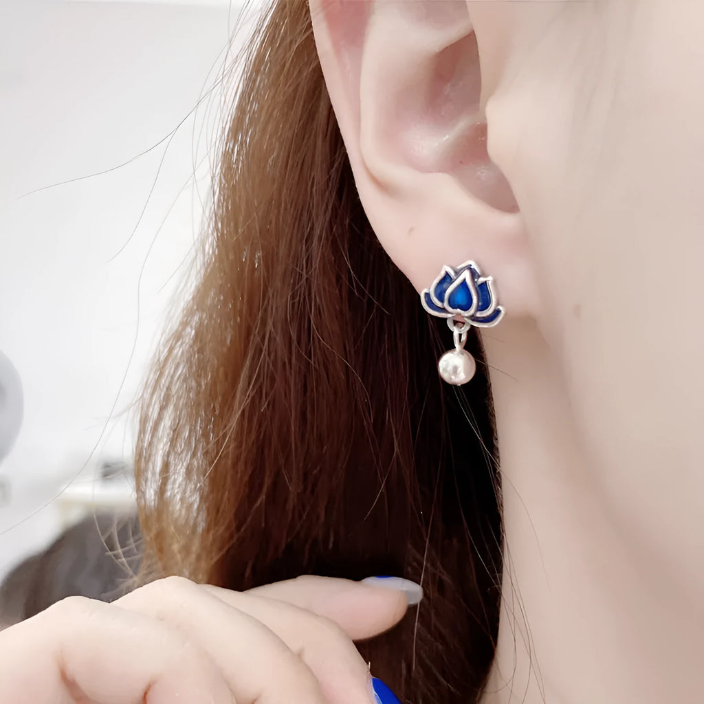 Blue lotus earrings with retro artistic design featuring lotus seedpod tassel detailing on 1.2cm wide ear studs