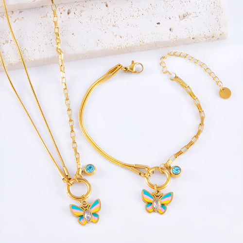 Gold-coloured titanium steel butterfly jewellery set with necklace and bracelet showing epoxy resin pendants