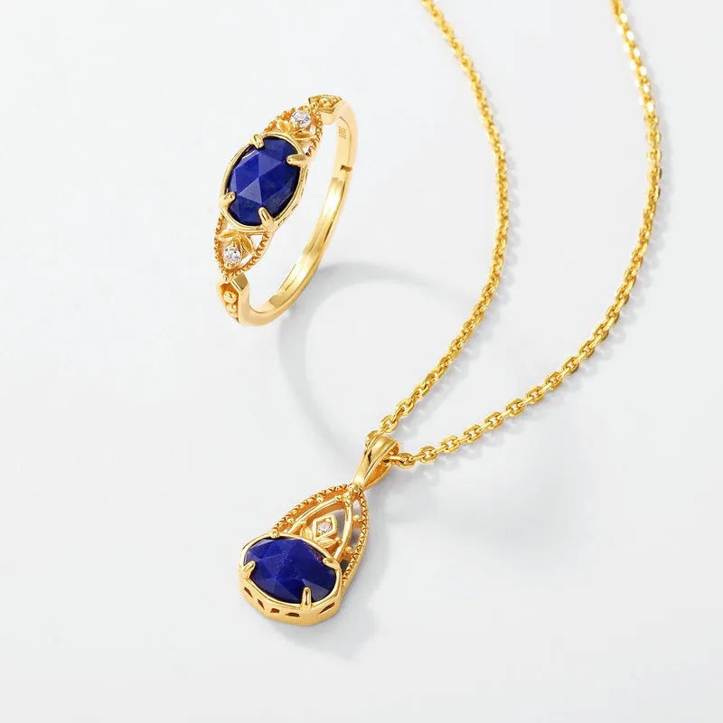 Women's oval geometric silver ring with deep blue lapis lazuli stone and round elements
