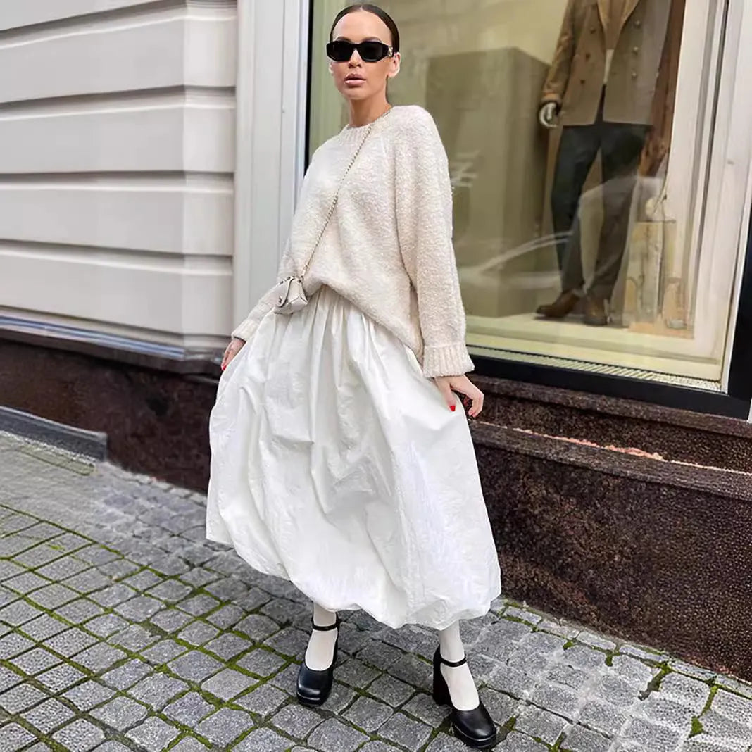 Women's solid colour cotton midi skirt in black or white showing long length
