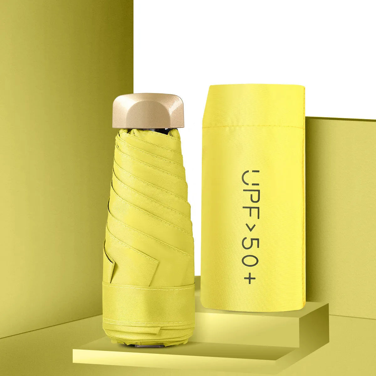 Closed five-fold mini pocket sun umbrella showing compact size and rubber handle