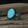 Men's antique silver alloy ring with turquoise centre in simple round design