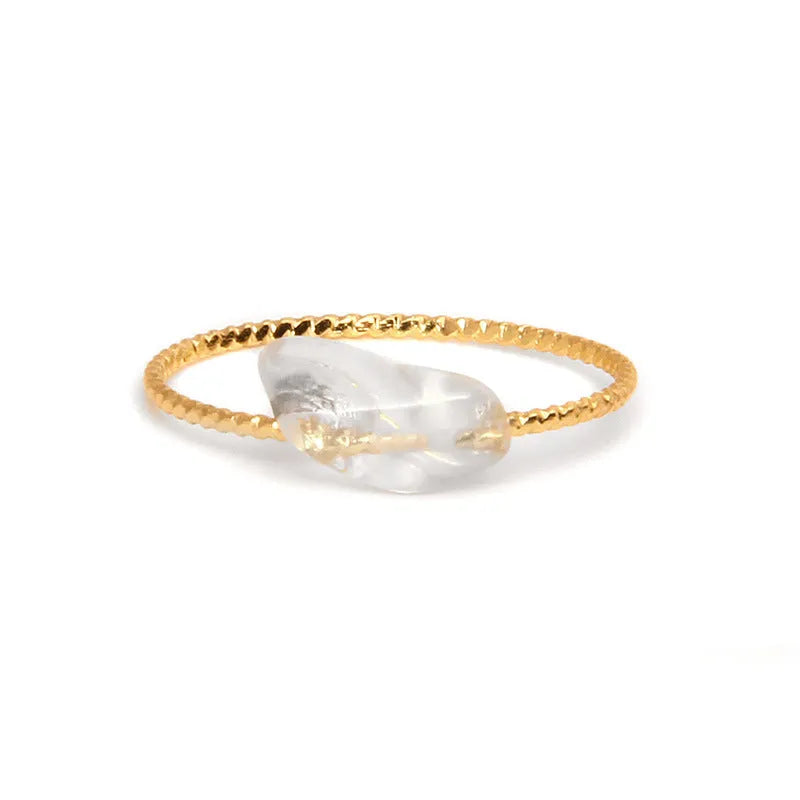 Geometric shaped agate ring for women on a hand, showing original design and coloured stone.