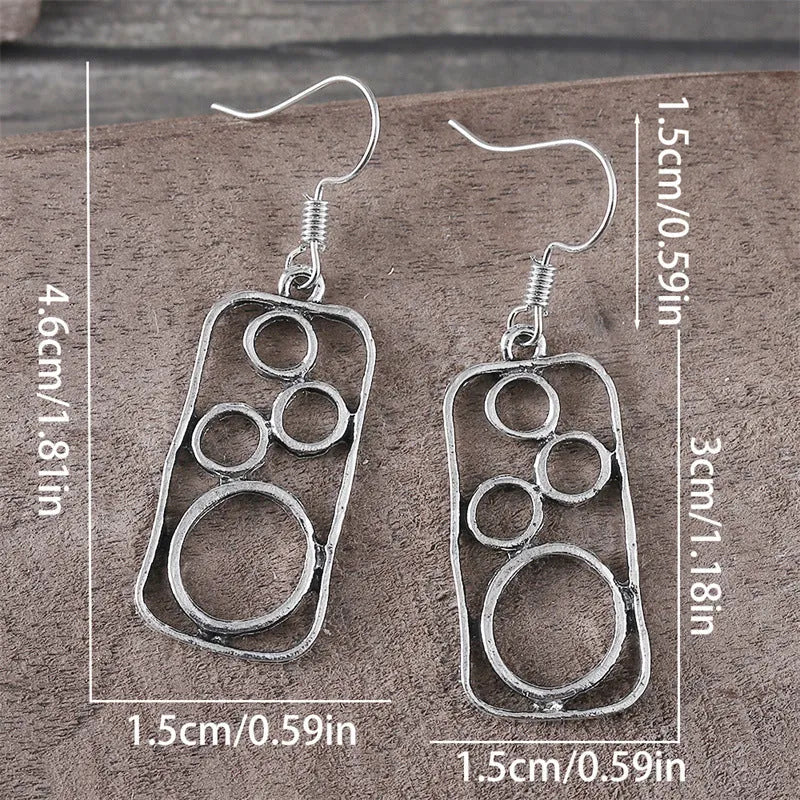 Geometric round ring earrings with irregular square shape in antique silver colour