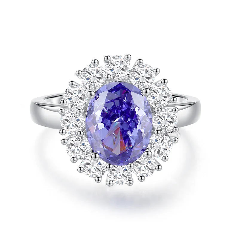 Close-up of a women's heart-shaped sterling silver ring with an ice flower cut tan sang colour zircon stone.