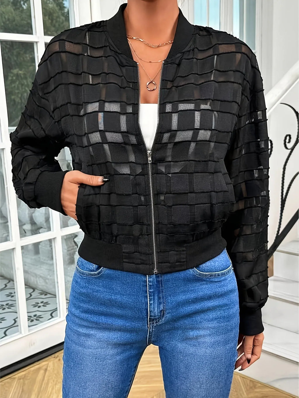 Black women's casual jacket with geometric pattern on semi-transparent polyester fabric featuring front zipper