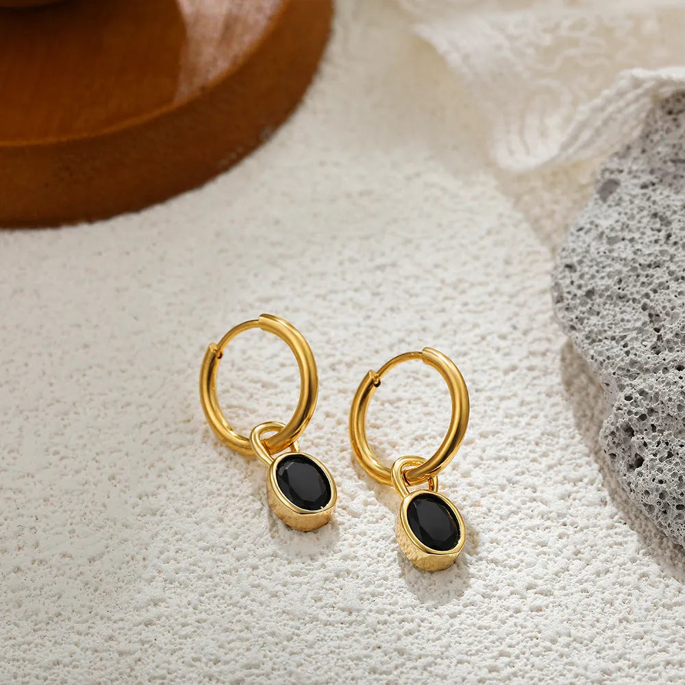 Women's retro-style oval zircon earrings in copper, showing multiple colour options.