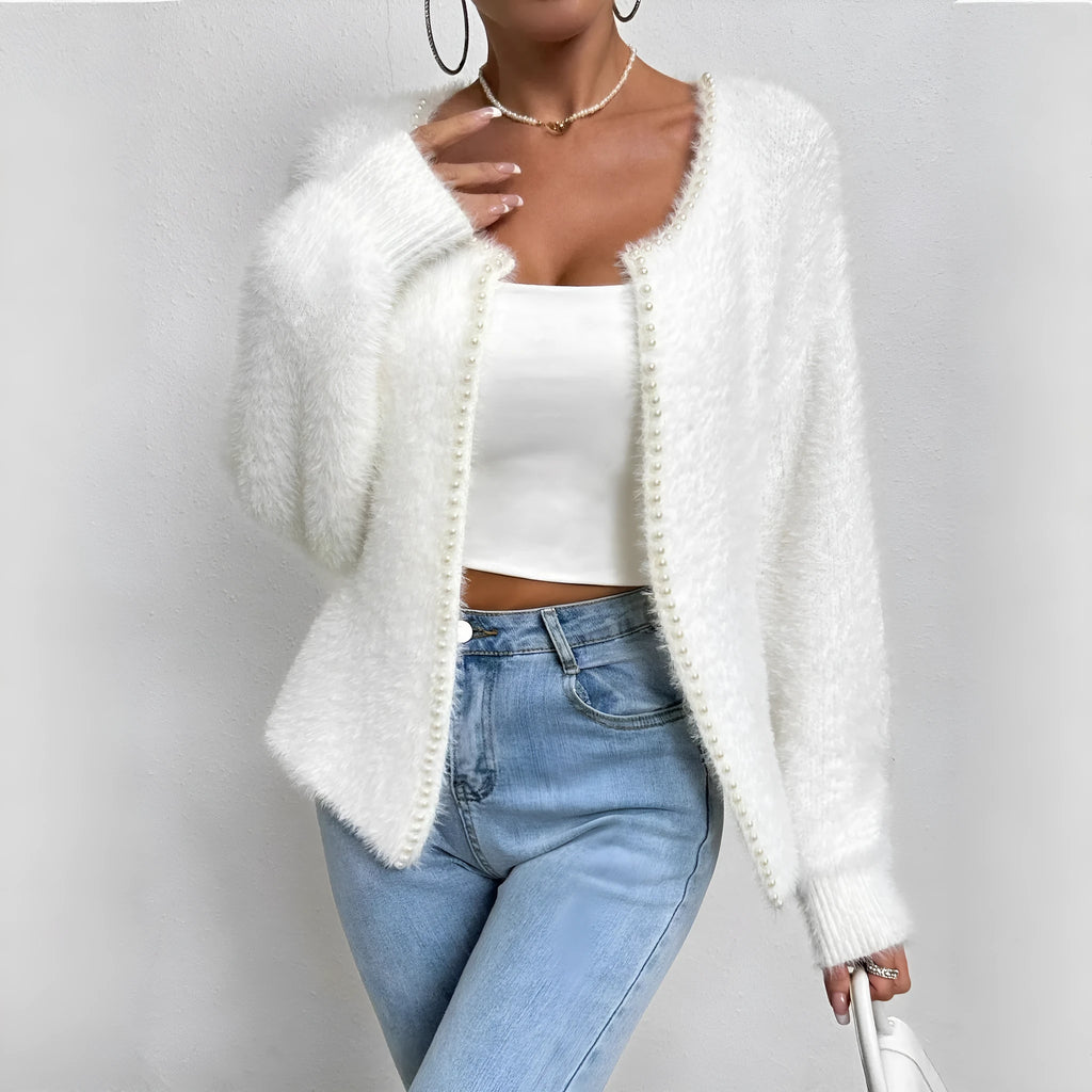 White women's V-neck cardigan sweater in polyester knit fabric
