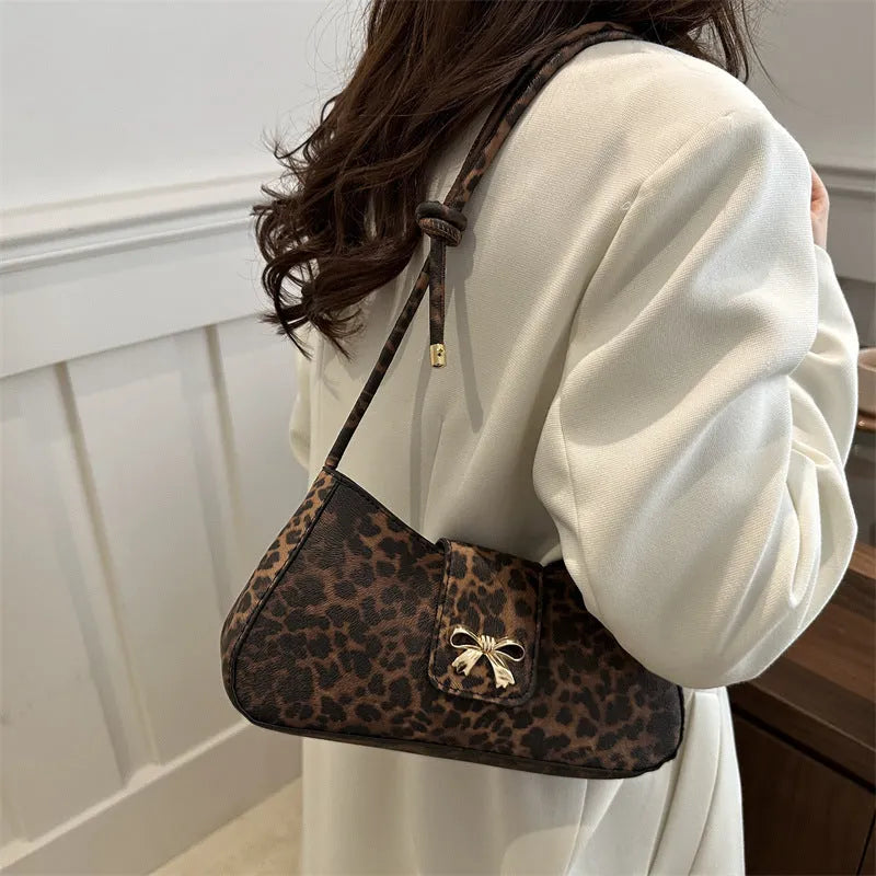 Casual PU leather handbag with sandwich pocket in black colour showing dimensions and design