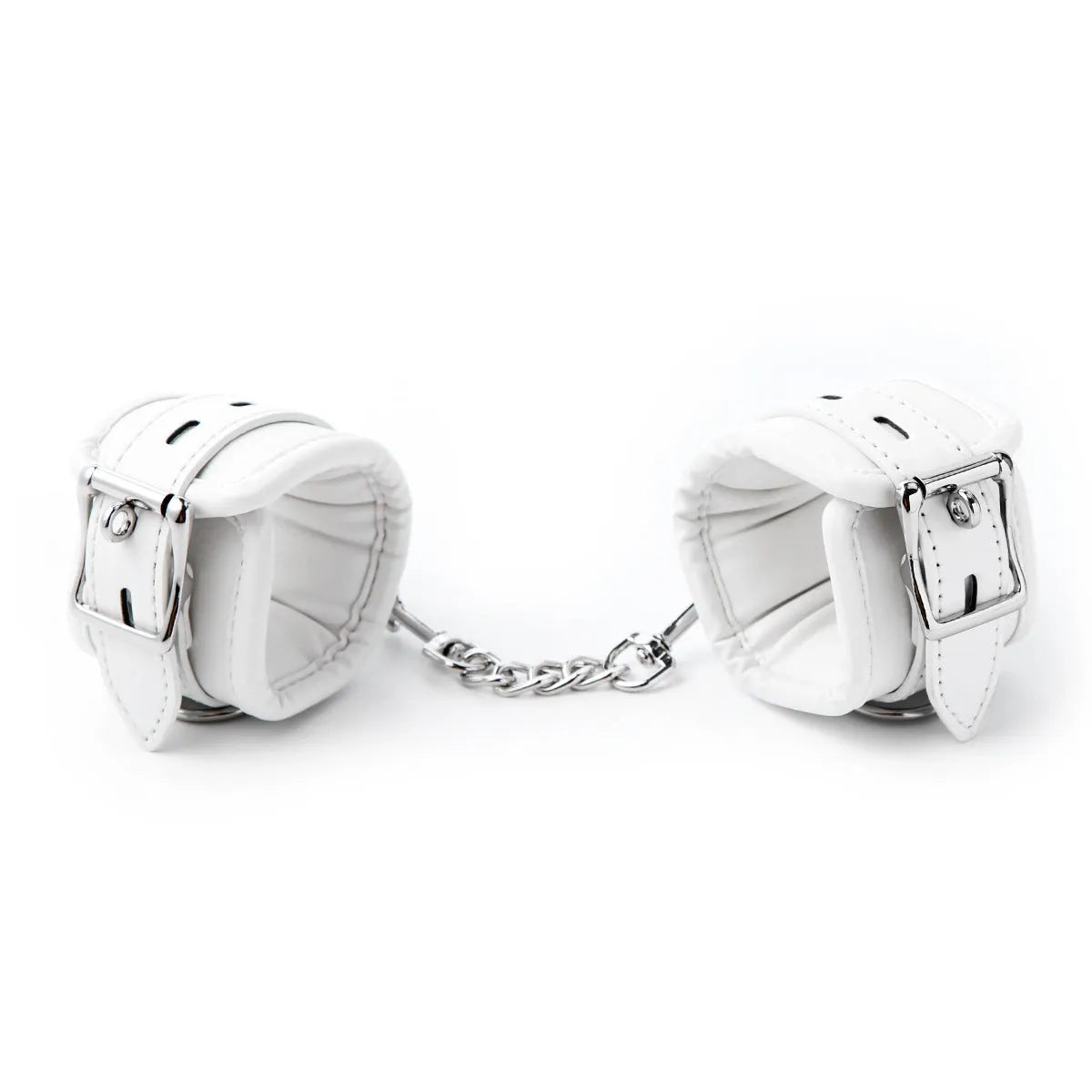 White PU sponge bondage set showing handcuffs, footcuffs, and a neck scarf laid out.