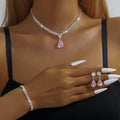 Claw chain necklace and earrings set with water drop rhinestones in multiple colour options