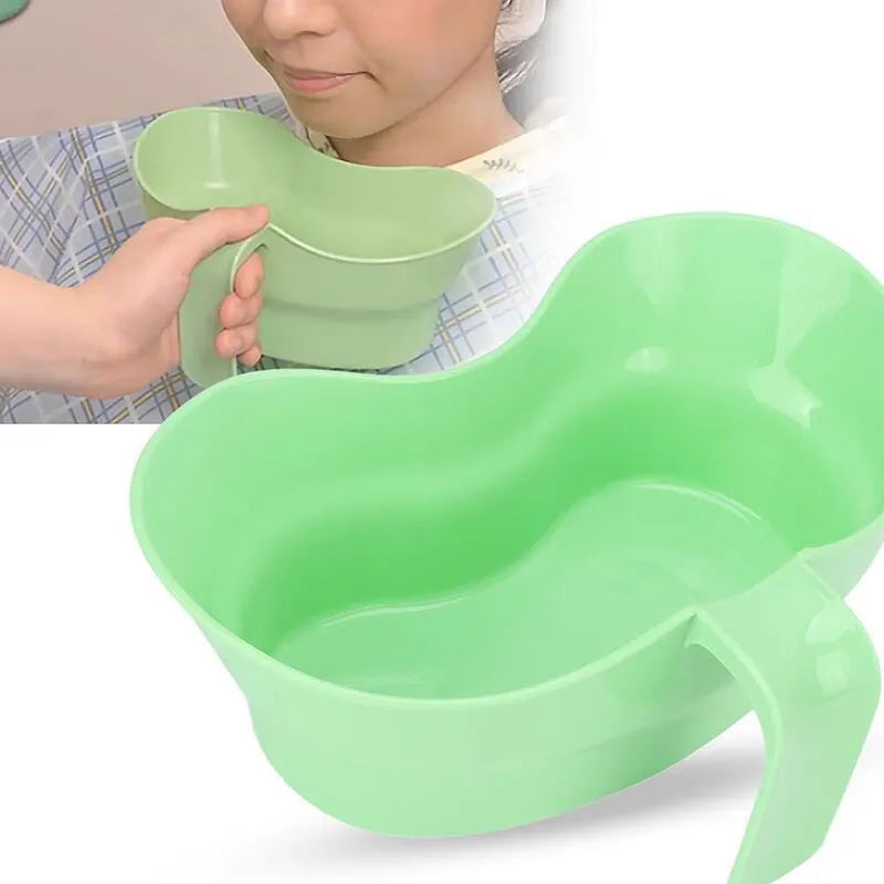 Green plastic gargle cup for bedridden elderly patient oral care and hydration
