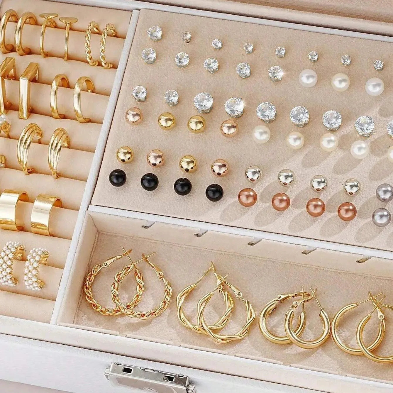 108 gold and yellow geometric alloy pearl earrings arranged in a set.