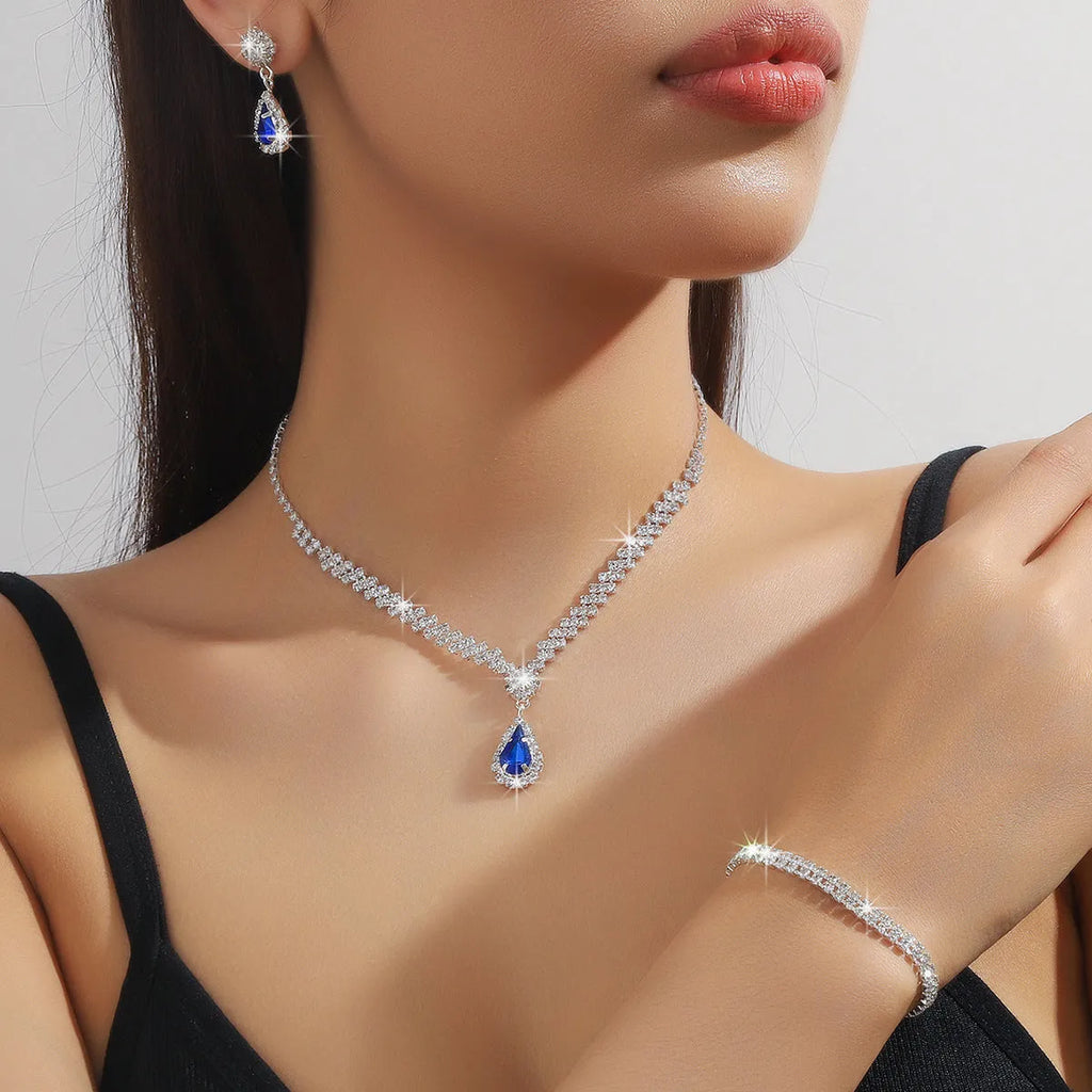 Claw chain necklace and earrings set with water drop rhinestones in multiple colour options