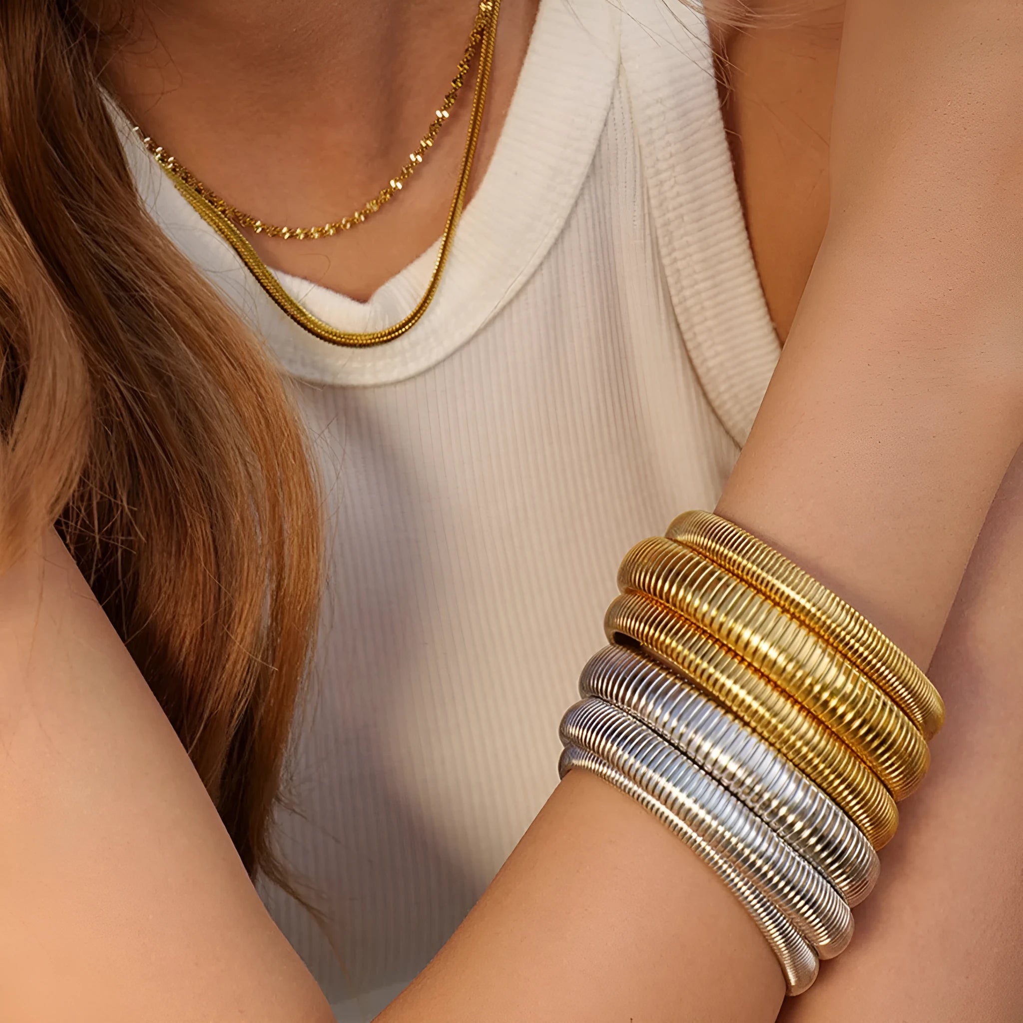 Women's gold elastic titanium steel bracelet with exaggerated vertical stripe ring pattern