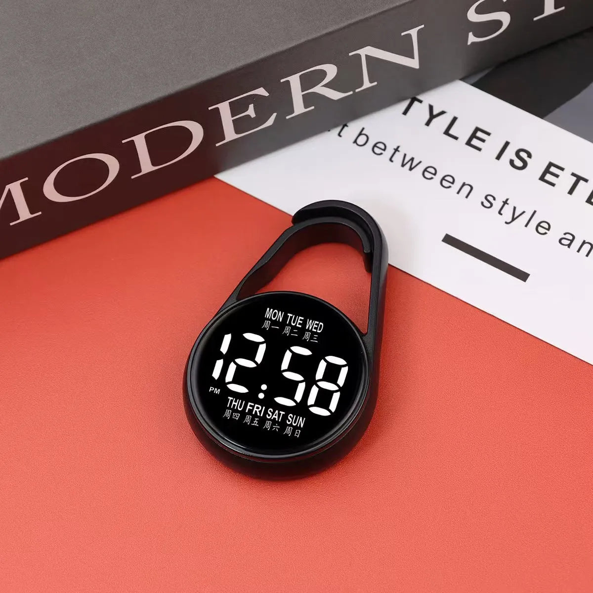 LED digital wristwatch showing time and week day on display, with plastic strap.