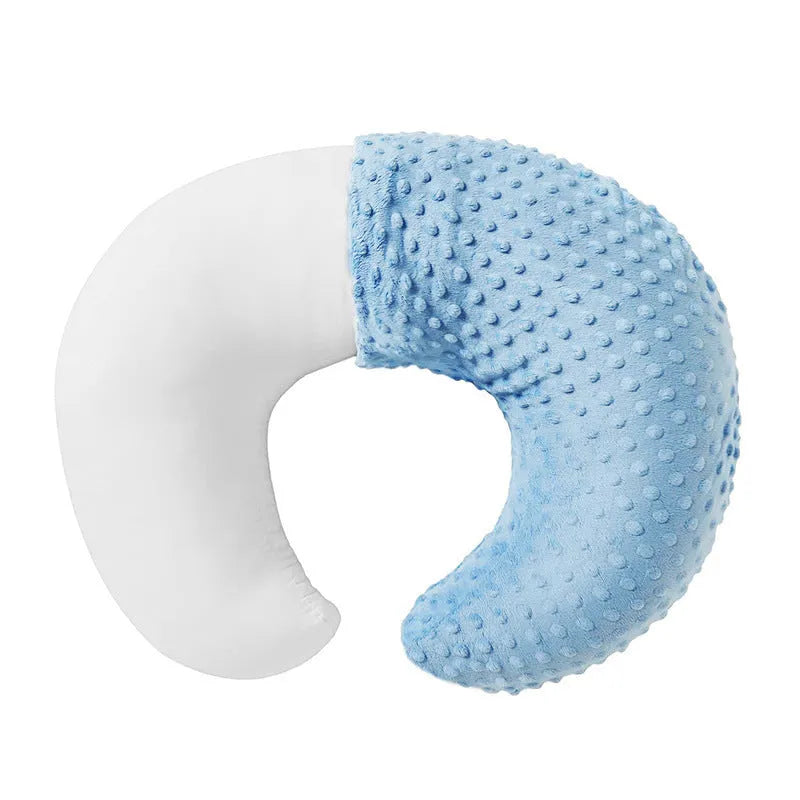 Multifunctional nursing pillow with a removable cover in grey, designed for feeding support and spill prevention.