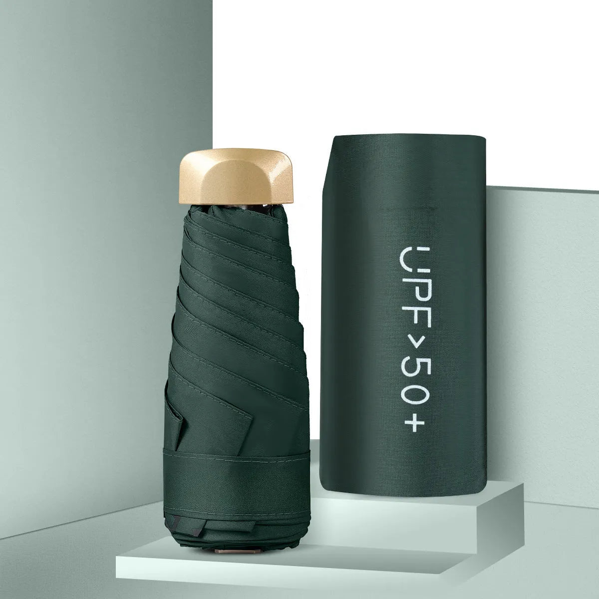 Closed five-fold mini pocket sun umbrella showing compact size and rubber handle
