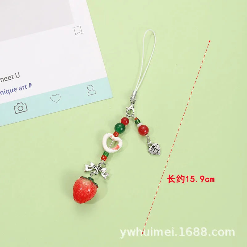 Plastic resin mobile phone charm keychain with fruit patterns including apple and strawberry designs