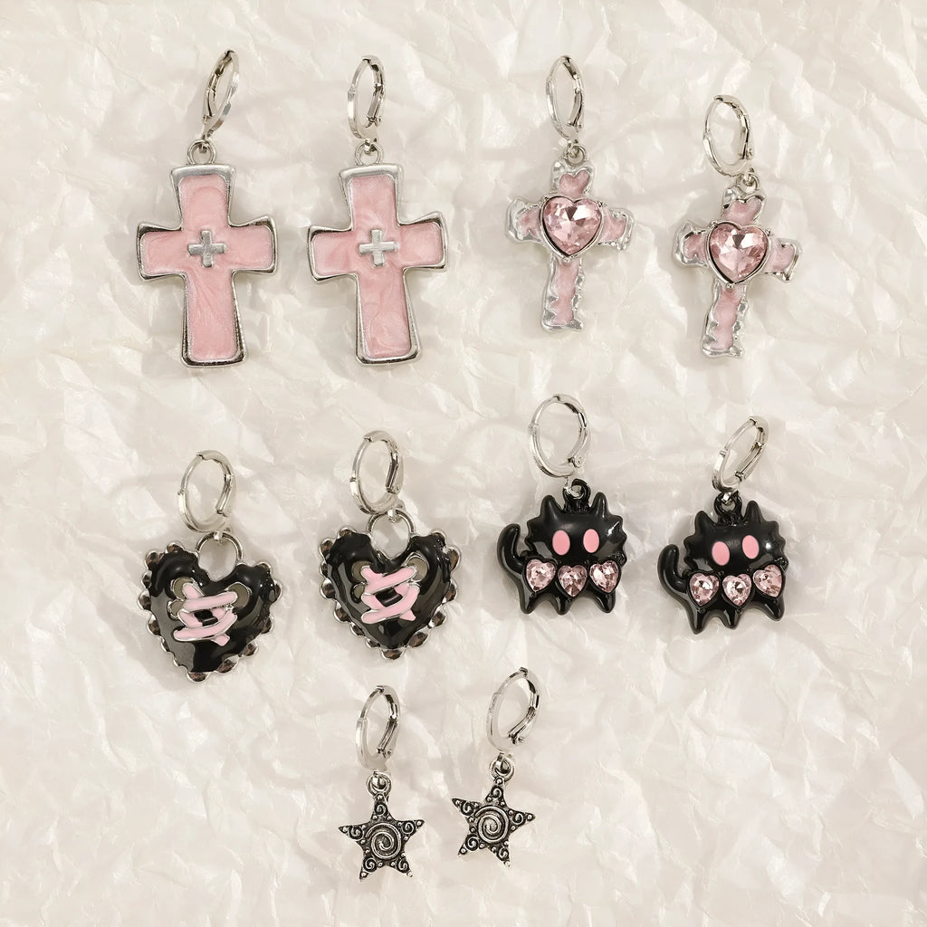 Women's alloy earrings in cross, heart and animal designs with multiple colour options