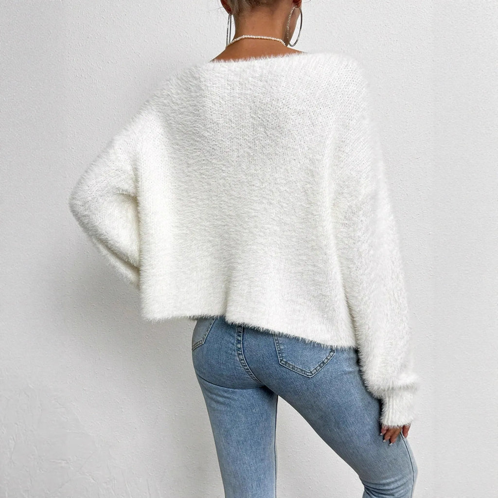 White women's V-neck cardigan sweater in polyester knit fabric