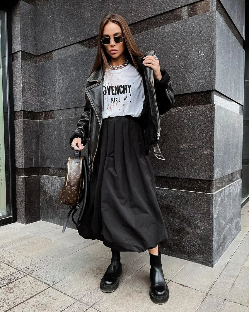 Women's solid colour cotton midi skirt in black or white showing long length