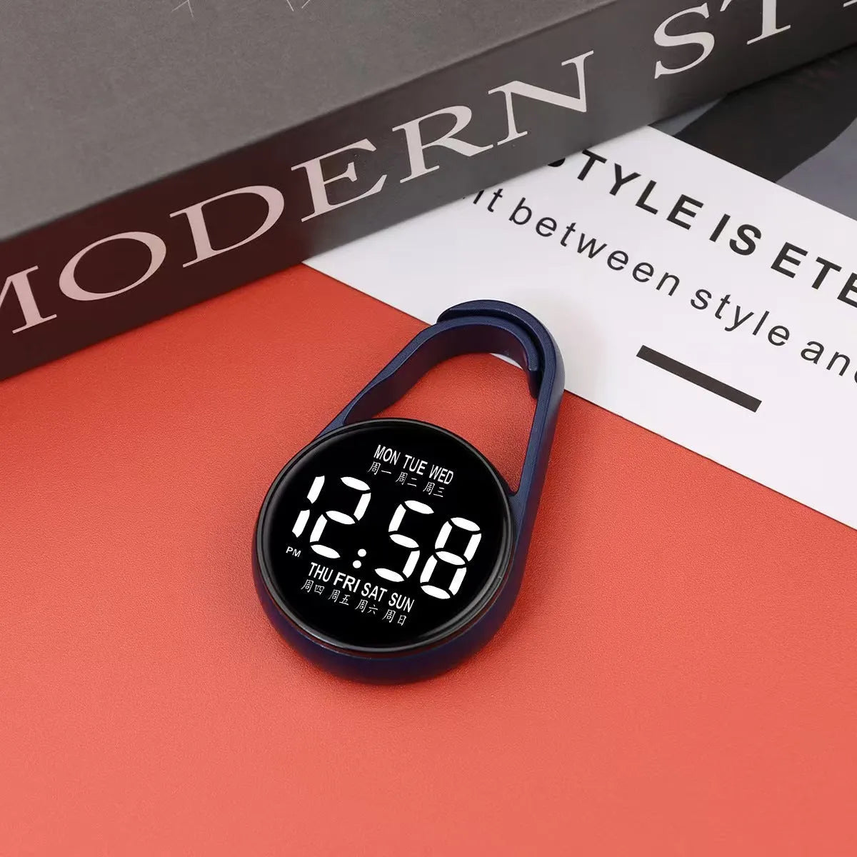 LED digital wristwatch showing time and week day on display, with plastic strap.