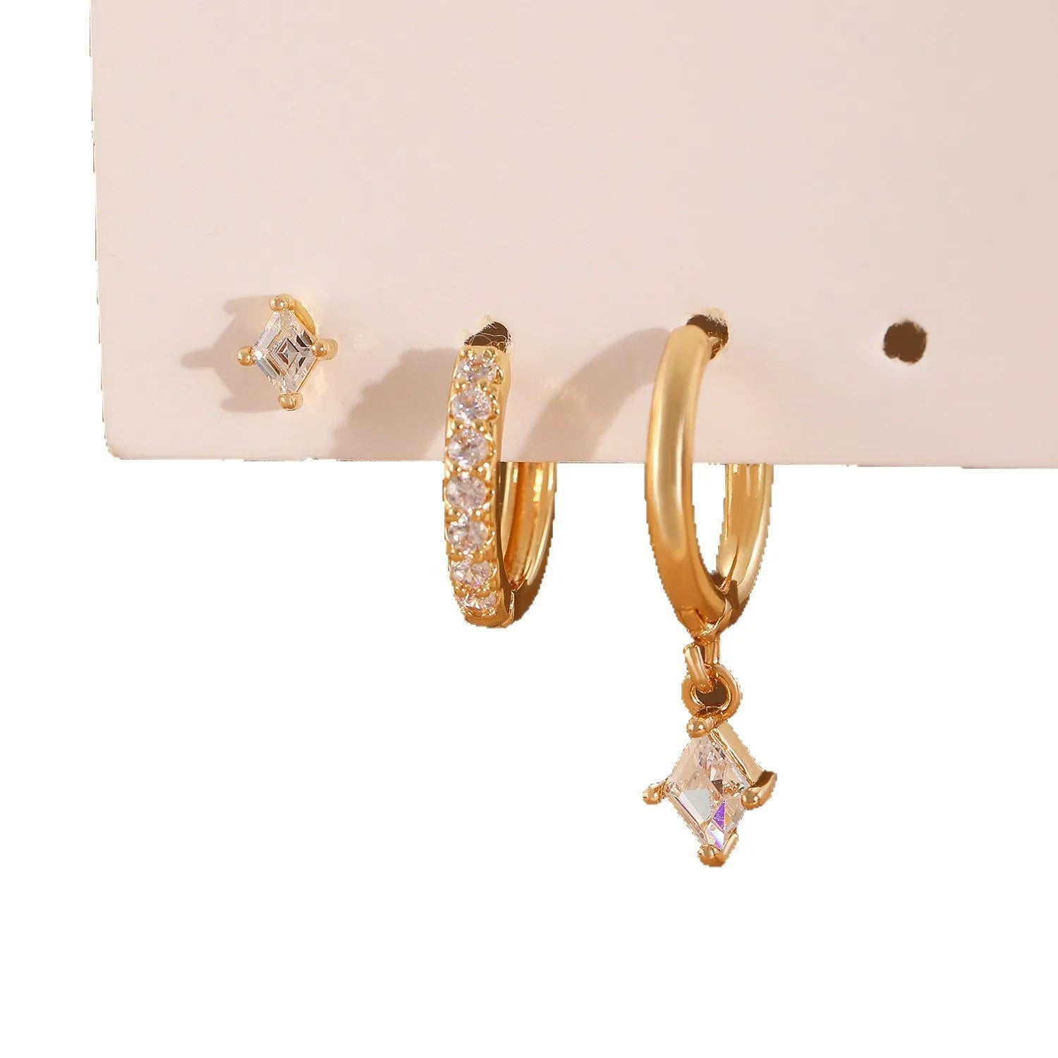 Three-piece ladies earring set with geometric zircon patterns on copper in gold and white colours