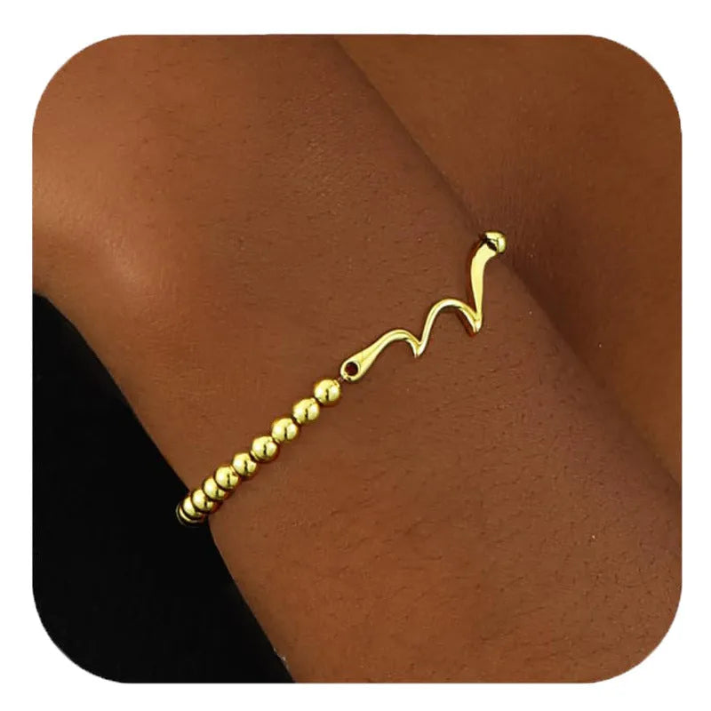 Adjustable stainless steel beaded bracelet with geometric shapes and round elements